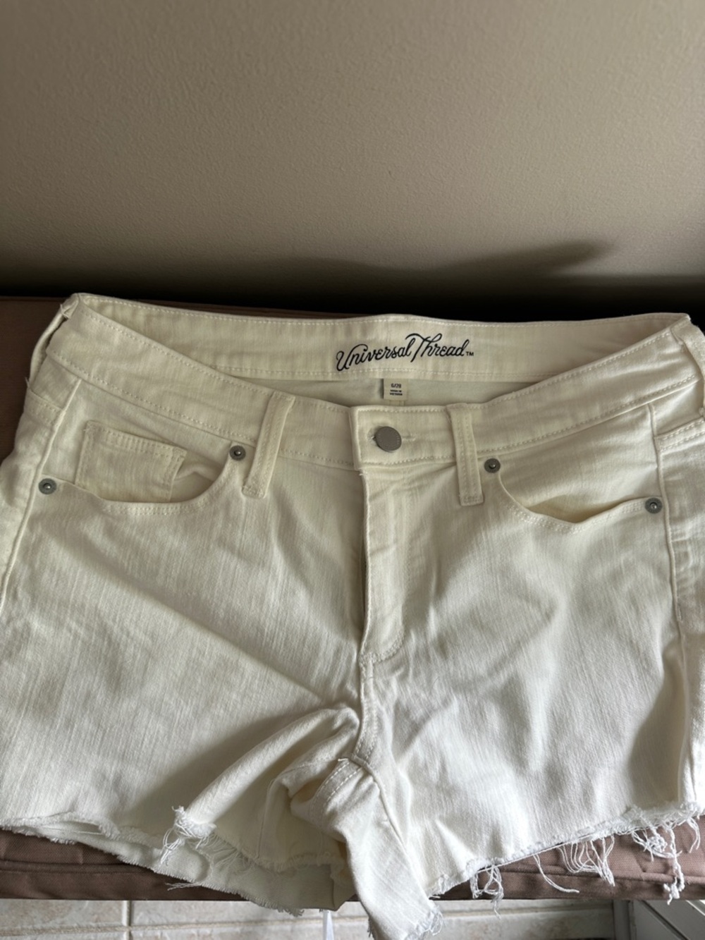 Universal Thread Cream Denim Cutoff Shorts with Frayed Hem